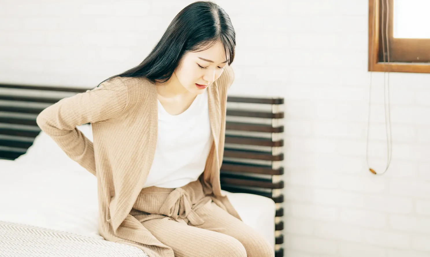 骨盤のゆがみで悩む女性